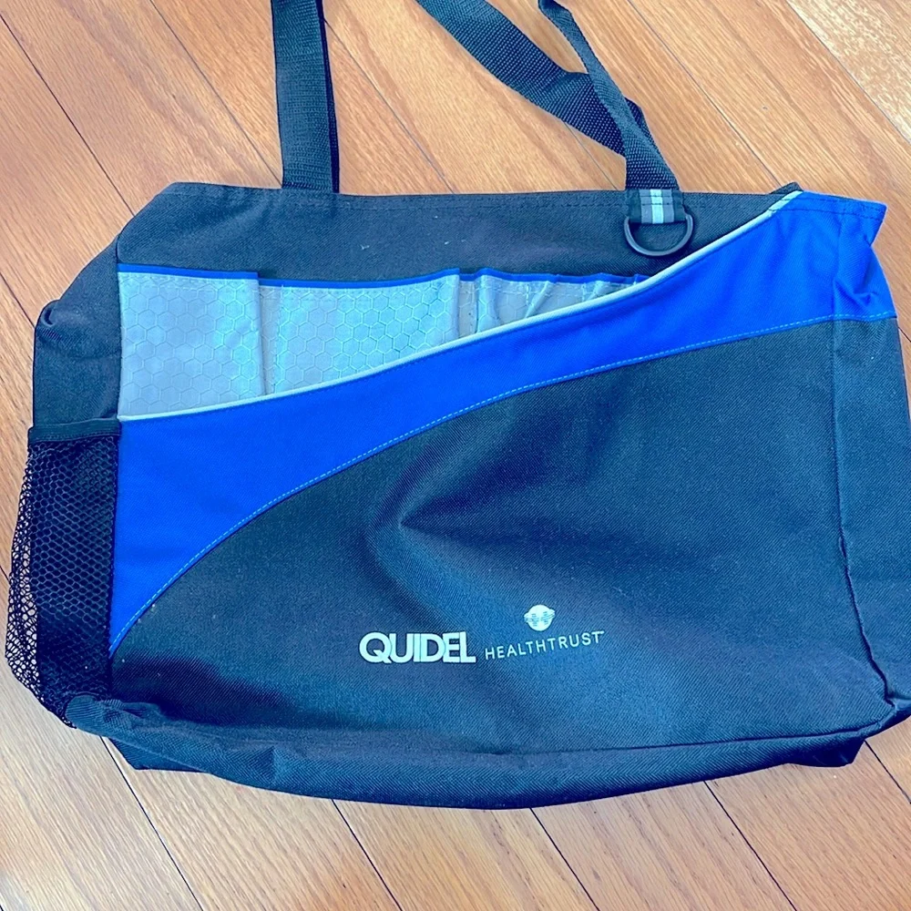 Black and blue zippered Laptop Bag with Velcro closed outside pocket